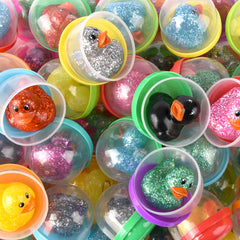 1.5" Rubber Glitter Duckling In 2" Capsule 250ct -  LLB Toys